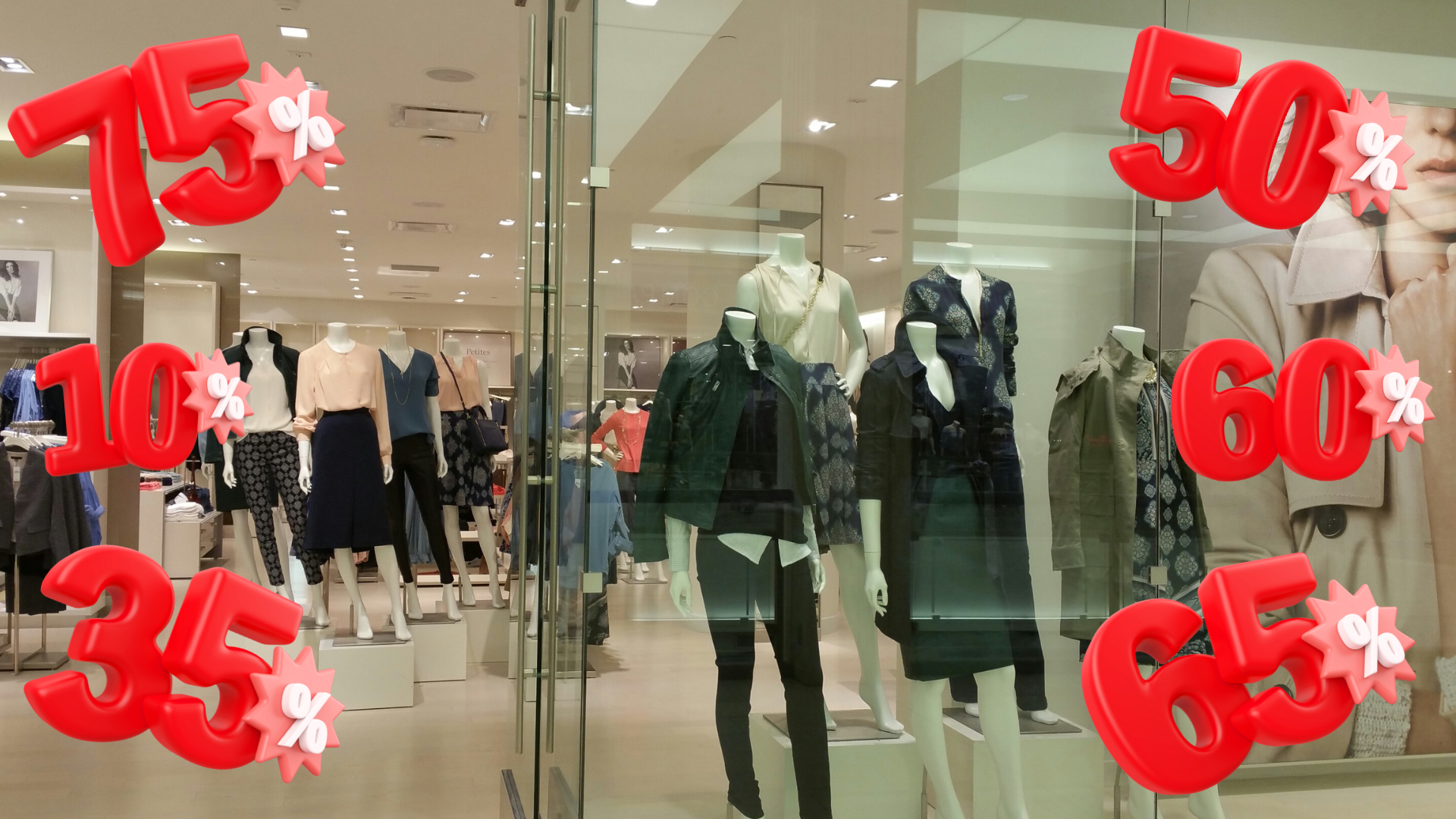 vitrine d'un magasin de vetements qui affiche des promotions de 50 à 65%